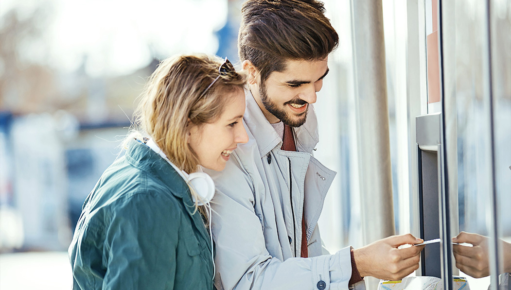 Couple at ATM Machine