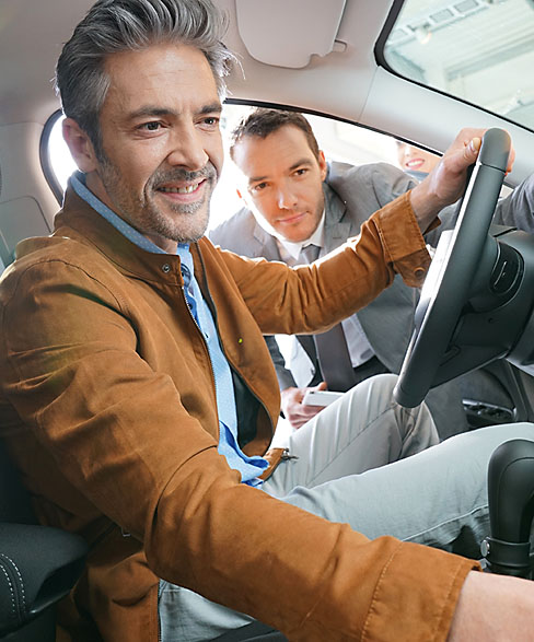 Photo of Man buying a car