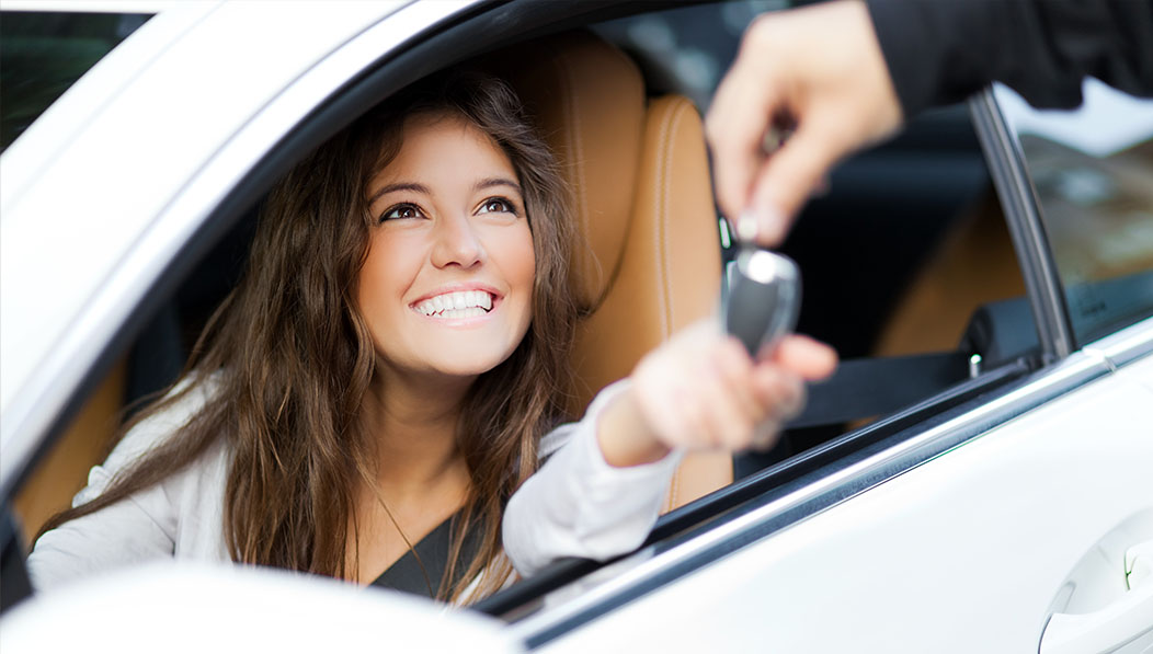 Photo of Young Lady in New Car